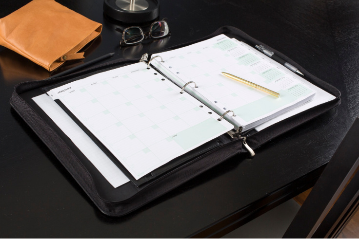 Open Day-Timer planner on a desk